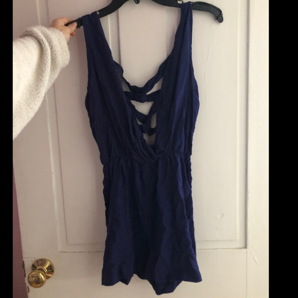 Deep cut navy blue romper
